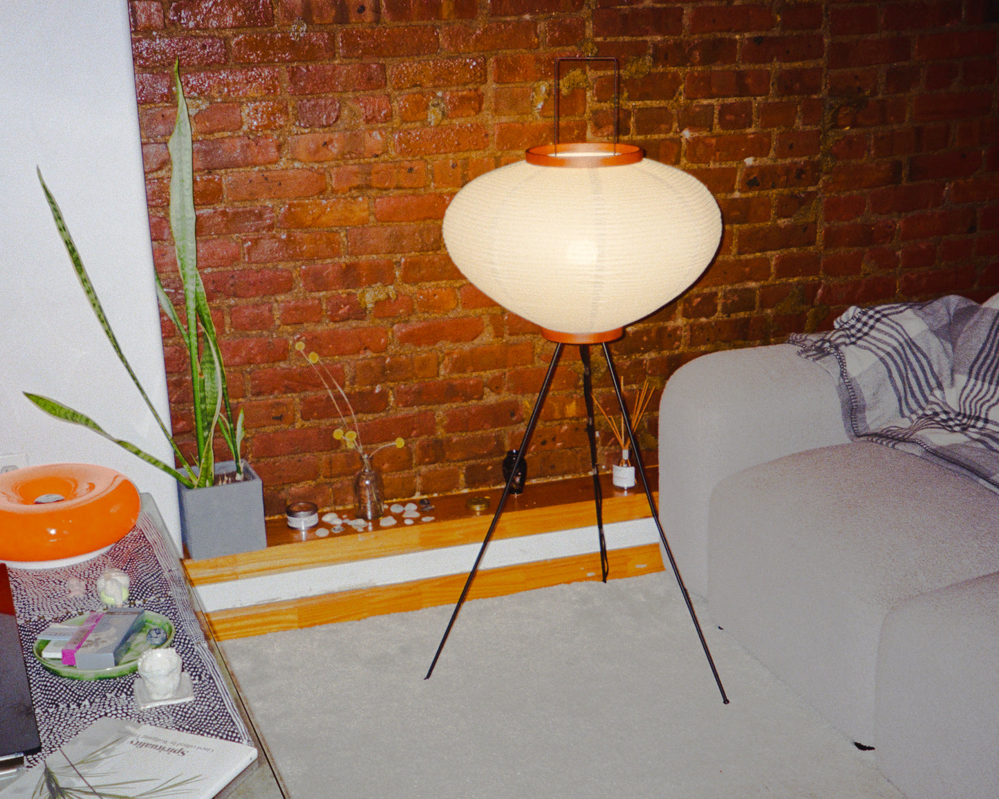 The Akari Moon Jar - Lucy’s Lamps is a modern paper lantern floor lamp with a soft glow, perfect as a minimalist lamp or aesthetic lamp. Functions as a light therapy lamp, LED floor lamp, tripod floor lamp, or bedside lamp for modern lamp for bedroom or floor lamps for living room.