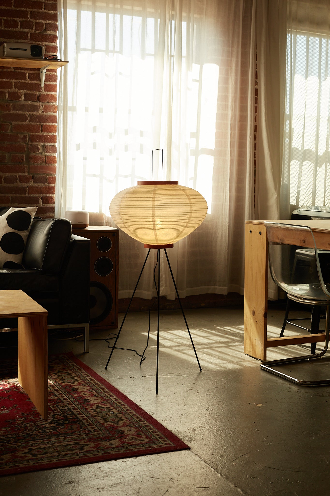 The Akari Moon Jar - Lucy’s Lamps is a modern paper lantern floor lamp with a soft glow, perfect as a minimalist lamp or aesthetic lamp. Functions as a light therapy lamp, LED floor lamp, tripod floor lamp, or bedside lamp for modern lamp for bedroom or floor lamps for living room.