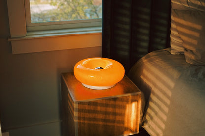 The Bergamot - Lucy’s Lamps is a retro stained glass orange lamp that functions as a modern table lamp or wall lamp. Ideal as a side table lamp, aesthetic desk lamp, or bedside table lamp. A perfect fit for bedroom table lamps, living room table lamps, or minimalist lamp table decor.