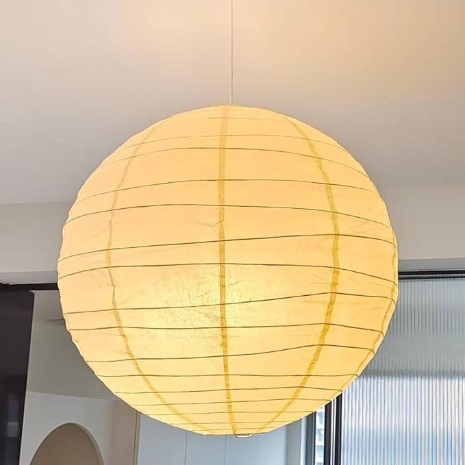 The Akari Boru - Lucy’s Lamps is a minimalist paper lantern pendant lamp inspired by traditional Japanese design. This aesthetic lamp adds a warm, soft glow to any room, perfect for living rooms, bedrooms, or reading spaces. Combining modern designer lighting with vintage charm, The Akari Boru creates a cozy, timeless ambiance ideal for both modern and retro interiors.