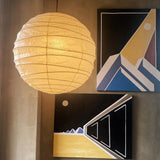 The Akari Boru - Lucy’s Lamps is a minimalist paper lantern pendant lamp inspired by traditional Japanese design. This aesthetic lamp adds a warm, soft glow to any room, perfect for living rooms, bedrooms, or reading spaces. Combining modern designer lighting with vintage charm, The Akari Boru creates a cozy, timeless ambiance ideal for both modern and retro interiors.