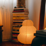 The Akari Enkei - Lucy’s Lamps is a minimalist paper lantern floor lamp with soft ambient glow. Ideal as a light therapy lamp, aesthetic lamp, or LED floor lamp. Perfect for bedroom floor lamp, tripod floor lamp, or modern floor lamps for living room and modern lamp for bedroom use.