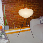 The Akari Moon Jar - Lucy’s Lamps is a modern paper lantern floor lamp with a soft glow, perfect as a minimalist lamp or aesthetic lamp. Functions as a light therapy lamp, LED floor lamp, tripod floor lamp, or bedside lamp for modern lamp for bedroom or floor lamps for living room.