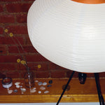 The Akari Moon Jar - Lucy’s Lamps is a modern paper lantern floor lamp with a soft glow, perfect as a minimalist lamp or aesthetic lamp. Functions as a light therapy lamp, LED floor lamp, tripod floor lamp, or bedside lamp for modern lamp for bedroom or floor lamps for living room.