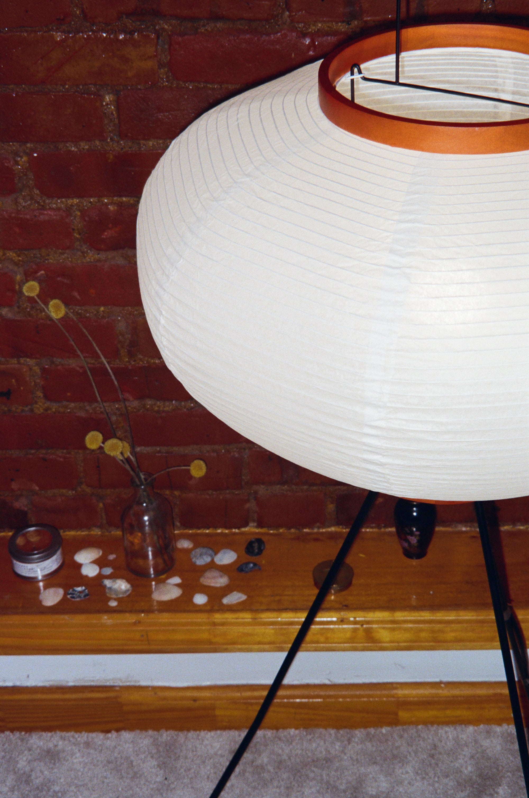 The Akari Moon Jar - Lucy’s Lamps is a modern paper lantern floor lamp with a soft glow, perfect as a minimalist lamp or aesthetic lamp. Functions as a light therapy lamp, LED floor lamp, tripod floor lamp, or bedside lamp for modern lamp for bedroom or floor lamps for living room.