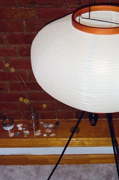 The Akari Moon Jar - Lucy’s Lamps is a modern paper lantern floor lamp with a soft glow, perfect as a minimalist lamp or aesthetic lamp. Functions as a light therapy lamp, LED floor lamp, tripod floor lamp, or bedside lamp for modern lamp for bedroom or floor lamps for living room.