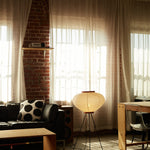 The Akari Moon Jar - Lucy’s Lamps is a modern paper lantern floor lamp with a soft glow, perfect as a minimalist lamp or aesthetic lamp. Functions as a light therapy lamp, LED floor lamp, tripod floor lamp, or bedside lamp for modern lamp for bedroom or floor lamps for living room.