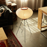 The Akari Moon Jar - Lucy’s Lamps is a modern paper lantern floor lamp with a soft glow, perfect as a minimalist lamp or aesthetic lamp. Functions as a light therapy lamp, LED floor lamp, tripod floor lamp, or bedside lamp for modern lamp for bedroom or floor lamps for living room.