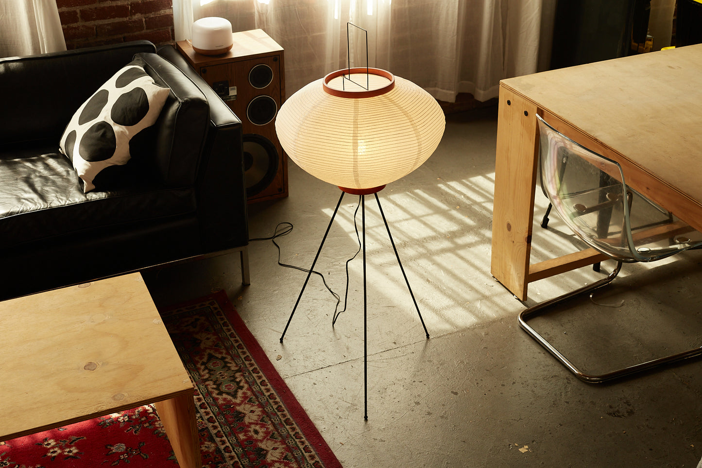 The Akari Moon Jar - Lucy’s Lamps is a modern paper lantern floor lamp with a soft glow, perfect as a minimalist lamp or aesthetic lamp. Functions as a light therapy lamp, LED floor lamp, tripod floor lamp, or bedside lamp for modern lamp for bedroom or floor lamps for living room.