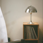 The Alleso - Lucy’s Lamps is a sleek chrome retro table lamp with a mid century modern silhouette. Ideal as an aesthetic lamp, bedside table lamp, or small desk lamp. This modern table lamp adds a touch of vintage light fixtures and designer lighting to any living room or bedroom setup.