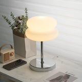 The Capella - Lucy’s Lamps retro stained glass lamp serves as a modern table lamp for bedroom or living room. This small desk lamp is perfect as a bedside table lamp, side table lamp, light therapy lamp, and aesthetic lamp for minimalist spaces. Explore Lucys Lamps for more home lighting ideas.