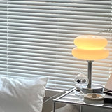 The Capella - Lucy’s Lamps retro stained glass lamp serves as a modern table lamp for bedroom or living room. This small desk lamp is perfect as a bedside table lamp, side table lamp, light therapy lamp, and aesthetic lamp for minimalist spaces. Explore Lucys Lamps for more home lighting ideas.