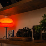 The Capella - Lucy’s Lamps retro stained glass orange table lamp serves as a modern table lamp for bedroom or living room. This small desk lamp is perfect as a bedside table lamp, side table lamp, light therapy lamp, and aesthetic lamp for minimalist spaces. Explore Lucys Lamps for more home lighting ideas.