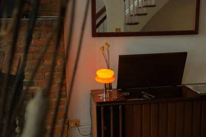 The Capella - Lucy’s Lamps retro stained glass orange table lamp serves as a modern table lamp for bedroom or living room. This small desk lamp is perfect as a bedside table lamp, side table lamp, light therapy lamp, and aesthetic lamp for minimalist spaces.