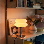 The Capella - Lucy’s Lamps retro stained glass lamp serves as a modern table lamp for bedroom or living room. This small desk lamp is perfect as a bedside table lamp, side table lamp, light therapy lamp, and aesthetic lamp for minimalist spaces. Explore Lucys Lamps for more home lighting ideas.