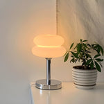 The Capella - Lucy’s Lamps retro stained glass lamp serves as a modern table lamp for bedroom or living room. This small desk lamp is perfect as a bedside table lamp, side table lamp, light therapy lamp, and aesthetic lamp for minimalist spaces. Explore Lucys Lamps for more home lighting ideas.