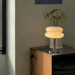 The Capella - Lucy’s Lamps retro stained glass lamp serves as a modern table lamp for bedroom or living room. This small desk lamp is perfect as a bedside table lamp, side table lamp, light therapy lamp, and aesthetic lamp for minimalist spaces. Explore Lucys Lamps for more home lighting ideas.