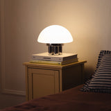 The Chroma - Lucy’s Lamps is a minimalist matte white table lamp with a modern mushroom silhouette. Perfect as a bedside lamp, side table lamp, or aesthetic desk lamp. This retro table lamp fits well in modern lamp for bedroom, small desk lamp setups, or living room table lamps.
