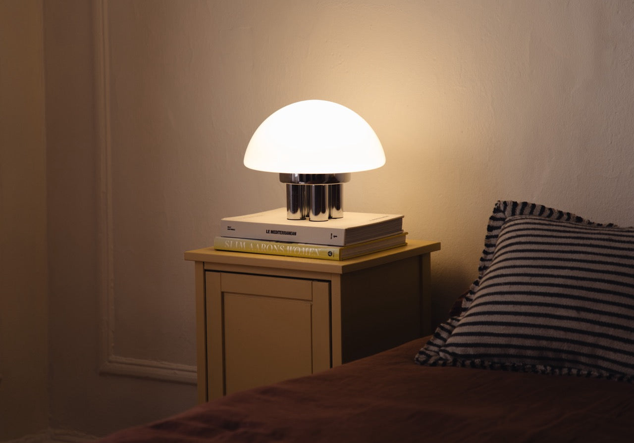 The Chroma - Lucy’s Lamps is a minimalist matte white table lamp with a modern mushroom silhouette. Perfect as a bedside lamp, side table lamp, or aesthetic desk lamp. This retro table lamp fits well in modern lamp for bedroom, small desk lamp setups, or living room table lamps.