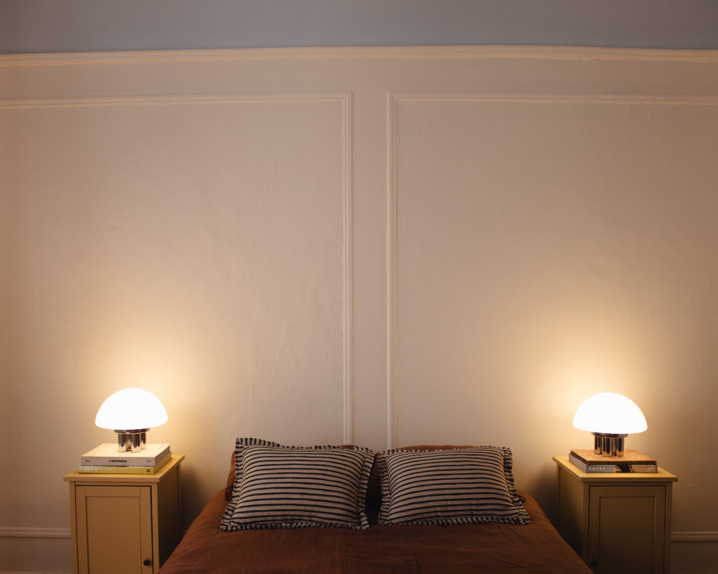 The Chroma - Lucy’s Lamps is a minimalist matte white table lamp with a modern mushroom silhouette. Perfect as a bedside lamp, side table lamp, or aesthetic desk lamp. This retro table lamp fits well in modern lamp for bedroom, small desk lamp setups, or living room table lamps.