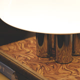 The Chroma - Lucy’s Lamps is a minimalist matte white table lamp with a modern mushroom silhouette. Perfect as a bedside lamp, side table lamp, or aesthetic desk lamp. This retro table lamp fits well in modern lamp for bedroom, small desk lamp setups, or living room table lamps.