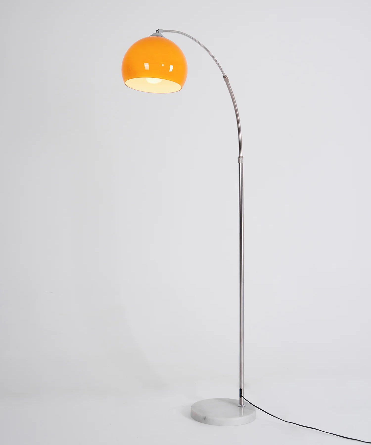 The Cosimo - Lucy’s Lamps is a retro stained glass orange floor lamp designed as a modern arc floor lamp. This aesthetic lamp works as a minimalist arc lamp, LED floor lamp, tripod floor lamp, or corner floor lamp. Ideal for modern lamp for bedroom or floor lamps for living room setups.
