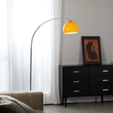 The Cosimo - Lucy’s Lamps is a retro stained glass orange floor lamp designed as a modern arc floor lamp. This aesthetic lamp works as a minimalist arc lamp, LED floor lamp, tripod floor lamp, or corner floor lamp. Ideal for modern lamp for bedroom or floor lamps for living room setups.