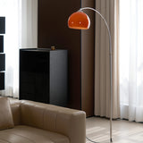 The Cosimo - Lucy’s Lamps is a retro stained glass orange floor lamp designed as a modern arc floor lamp. This aesthetic lamp works as a minimalist arc lamp, LED floor lamp, tripod floor lamp, or corner floor lamp. Ideal for modern lamp for bedroom or floor lamps for living room setups.