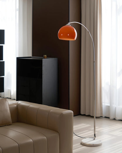 The Cosimo - Lucy’s Lamps is a retro stained glass orange floor lamp designed as a modern arc floor lamp. This aesthetic lamp works as a minimalist arc lamp, LED floor lamp, tripod floor lamp, or corner floor lamp. Ideal for modern lamp for bedroom or floor lamps for living room setups.