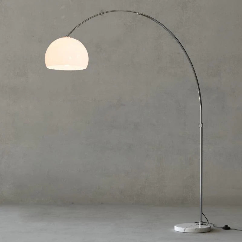 The Cosimo - Lucy’s Lamps is a retro stained glass orange floor lamp designed as a modern arc floor lamp. This aesthetic lamp works as a minimalist arc lamp, LED floor lamp, tripod floor lamp, or corner floor lamp. Ideal for modern lamp for bedroom or floor lamps for living room setups.