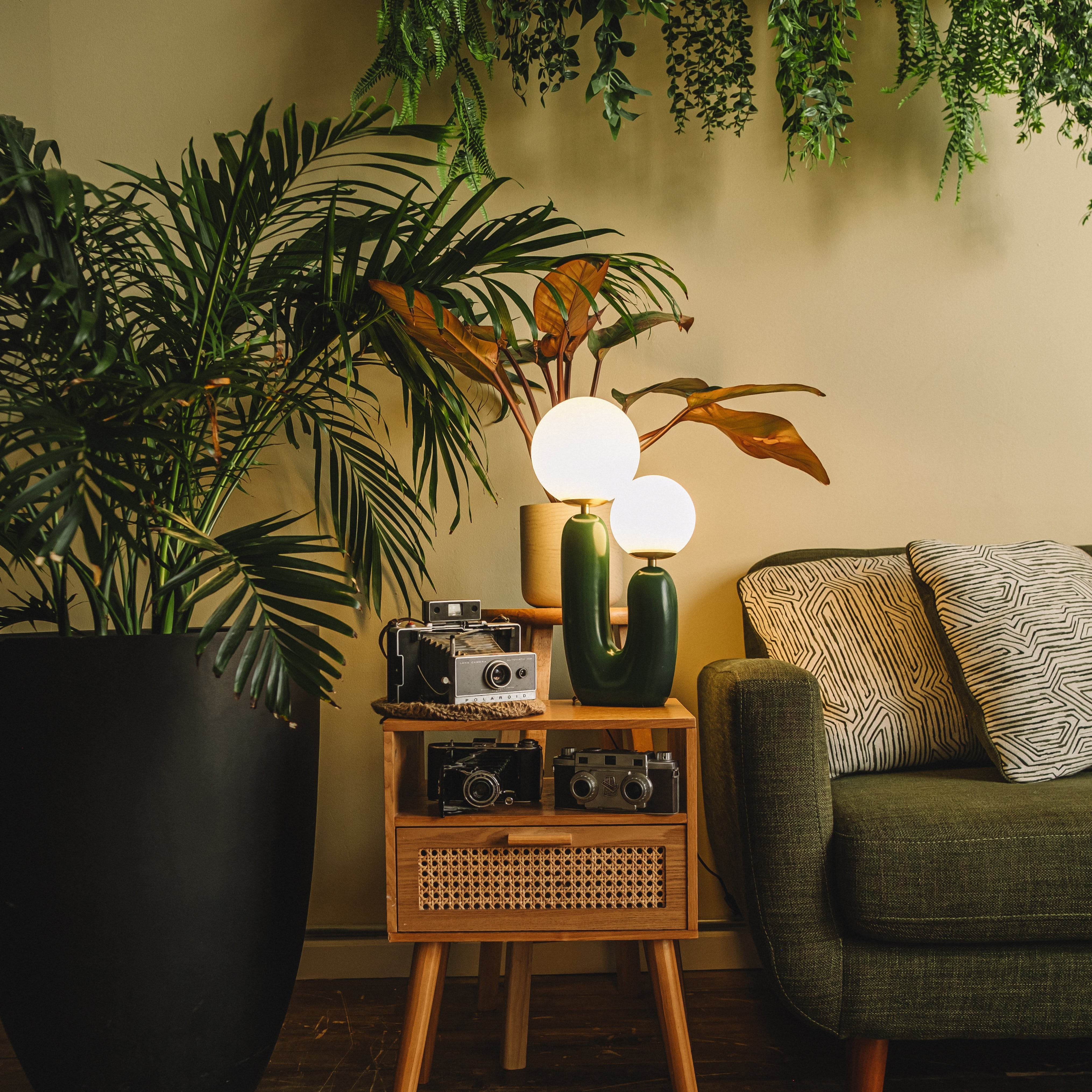 The Ophelia - Lucy’s Lamps is a modern table lamp with a sculptural cactus-inspired base and twin frosted glass globes. This aesthetic lamp serves as a minimalist bedside lamp, desk lamp, or side table lamp for living rooms and bedrooms. Combining retro charm and modern designer lighting, The Ophelia adds warmth, elegance, and vintage sophistication to any home décor.