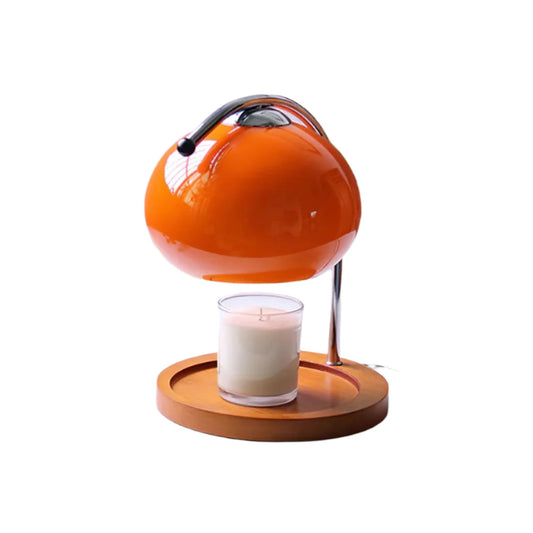 The Solange - Lucy’s Lamps is a modern orange glass table lamp with candle warmer lamp functionality. Aesthetic retro stained glass lamp ideal as a bedside table lamp, small desk lamp, or minimalist side table lamp. Perfect for bedroom table lamps or modern lamp for living room styling.