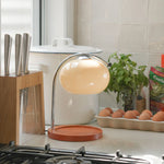 The Solange - Lucy’s Lamps is a modern table lamp with candle warmer lamp functionality. Aesthetic retro stained glass lamp ideal as a bedside table lamp, small desk lamp, or minimalist side table lamp. Perfect for bedroom table lamps or modern lamp for living room styling. Explore Lucys Lamps for more home lighting ideas.