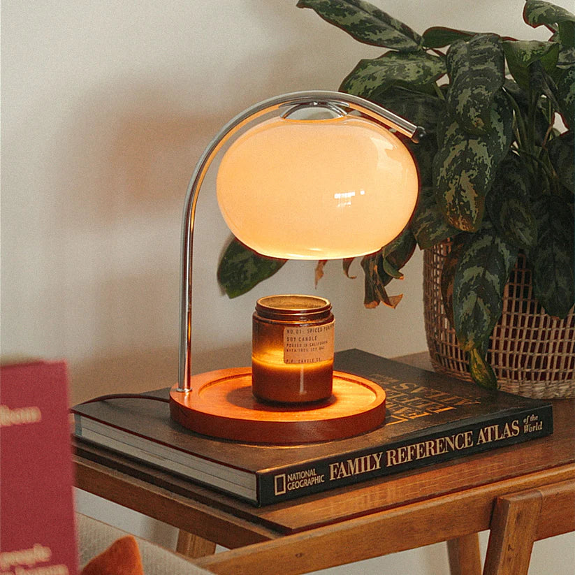The Solange - Lucy’s Lamps is a modern table lamp with candle warmer lamp functionality. Aesthetic retro stained glass lamp ideal as a bedside table lamp, small desk lamp, or minimalist side table lamp. Perfect for bedroom table lamps or modern lamp for living room styling. Explore Lucys Lamps for more home lighting ideas.